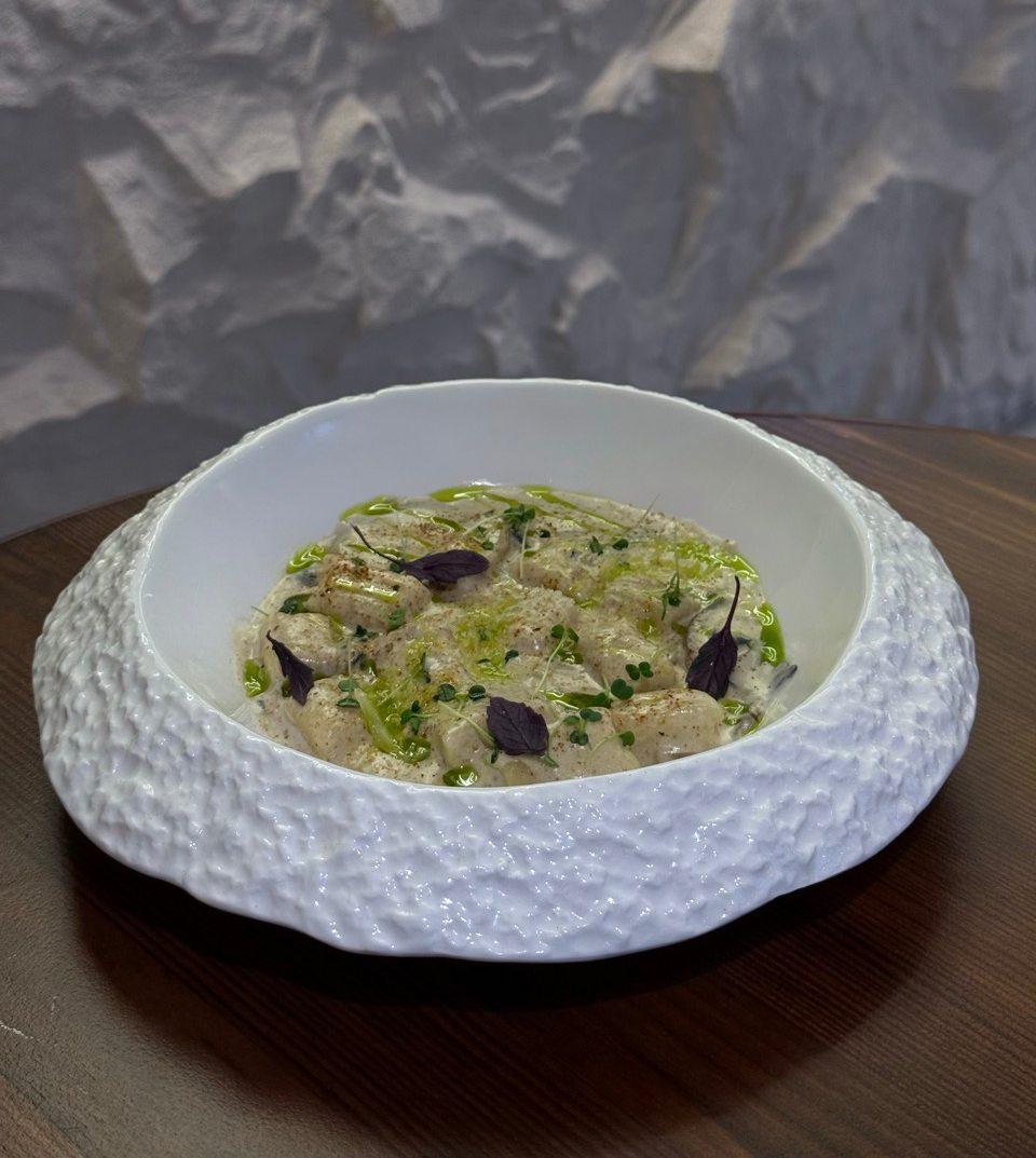 Potato gnocchi with mushrooms and parmesan